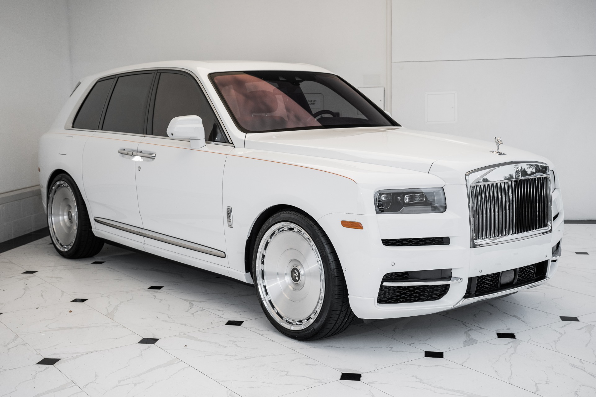 The RollsRoyce SUV Looks Like a Lifted Phantom Hatchback